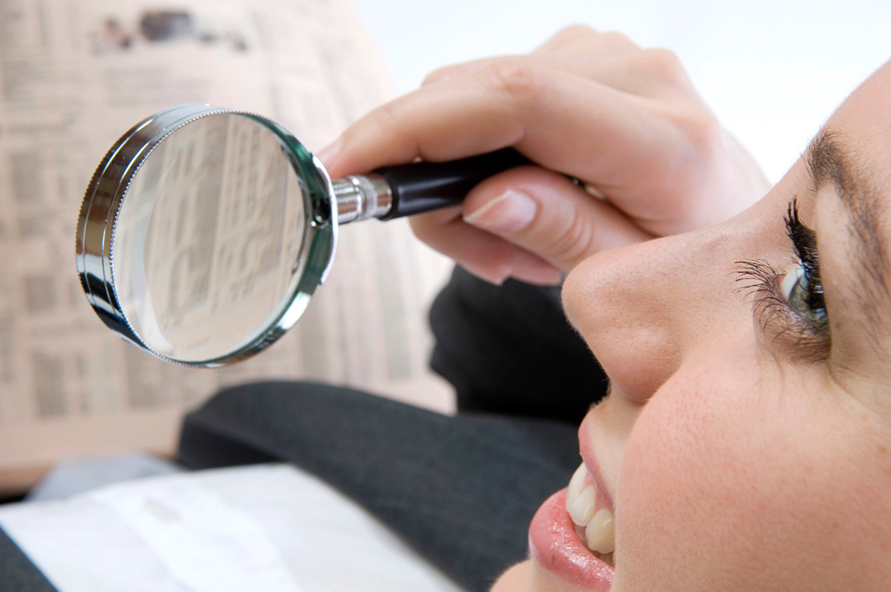 Sample image of reading with a magnifying glass